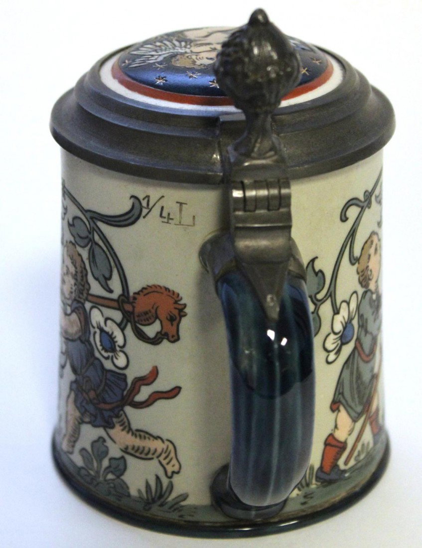 METTLACH GERMAN PORCELAIN LIDDED BEER STEIN: Old Mettlach Villeroy & Boch German porcelain 1/4 litre etched stein depicting Munich child with flowers and children with wooden horses. Mold number 2052. Measures 5 1/8" height x 4 3/4" length (13cm