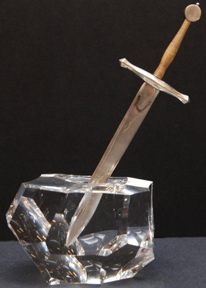STEUBEN EXCALIBUR LETTER OPENER w/ CRYSTAL BASE: In the Arthurian legend only a true king can withdraw the sword from the stone. In James Houston's contemporary interpretation of the myth, the sword is a letter knife and the stone a paperweight. Has