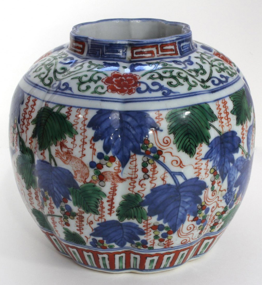 17th C CHINESE MING WUCAI PORCELAIN POT: Antique Chinese porcelain hand painted pumpkin shape vase. Depicts braches and leaves with squirrels and bats. Holds calligraphy Ming Dynasty WANLI mark to bottom. Measures approx. 6 5/8" height x 8" 