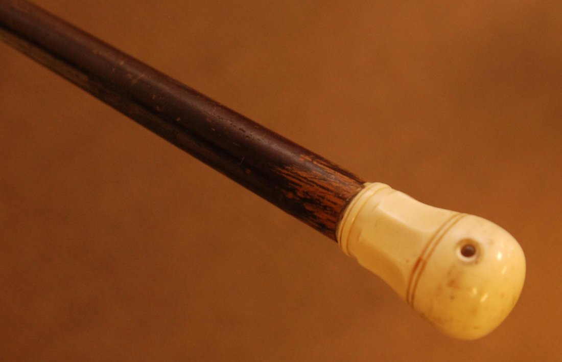 19th C IVORY HANDLE STANHOPE SCENE CANE: Antique hand carved ivory knob handle cane having a scene inside of handle depicting Starved Rock Stanhope, Niagara Falls, NY. Has wooden shaft with brass tip. Circa 1860. Measures 35 1/2" length (90.