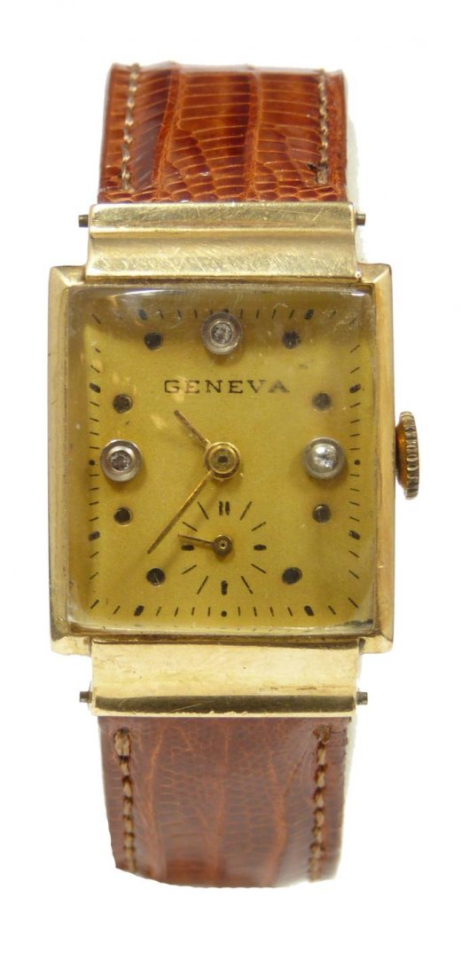 ANTIQUE GENEVA 14K YG GENT'S WRISTWATCH: Geneva antique 14k yellow gold wristwatch with lizard leather band. Has gold face with black enamel notches and three diamonds. Has gold hour, minute and sub second hands. Has Perfine Watch Co. Swiss