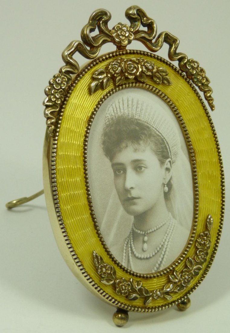 IMPERIAL RUSSIAN SILVER GUILLOCHE PICTURE FRAME: Imperial Russian silver yellow enameled guilloche picture frame. Holds Kokoshnik mark with 84 silver purity marks. Also holds Cyrillic workmaster marks mostly likely of Fedor Serebrennikov. Frame meas