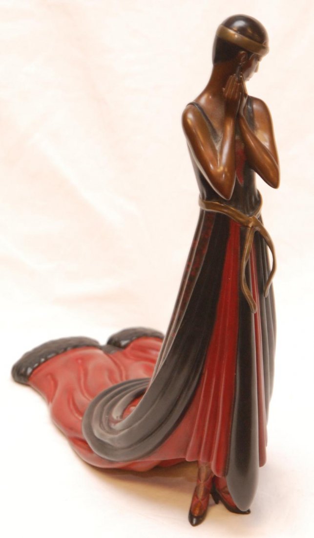ERTE BRONZE FIGURE OF WOMAN "SPLENDOR": Erté (Romain de Tirtoff) (1892-1990) (RUSSIAN/FRENCH, 1892-1990) bronze sculpture depicting a woman wearing a long black and red dress titled "Splendor". Dated 1980 and numbered 175/250. Measures 14