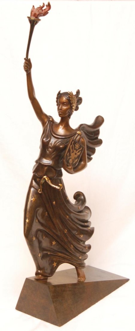 ERTE BRONZE LIMITED EDITION FIGURE OF LADY LIBERTY: Erte (RUSSIAN/FRENCH, 1892-1990) Bronze sculpture depicting lady liberty and titled "Liberty, Fearless & Free". She is holding the ever flaming torch extended in right hand and standing on inclining b