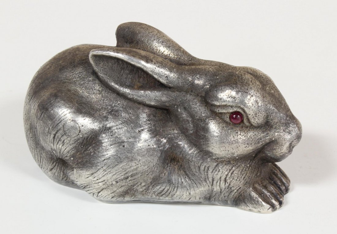 IMPERIAL RUSSIAN SILVER RABBIT FIGURE: Russian silver rabbit figure having cabochon cut ruby jewels set to eyes. Has town marks and 84 silver purity marks to bottom. Also holds Julius Rappaport workmaster marks to bottom. Measures 2 1/8" l
