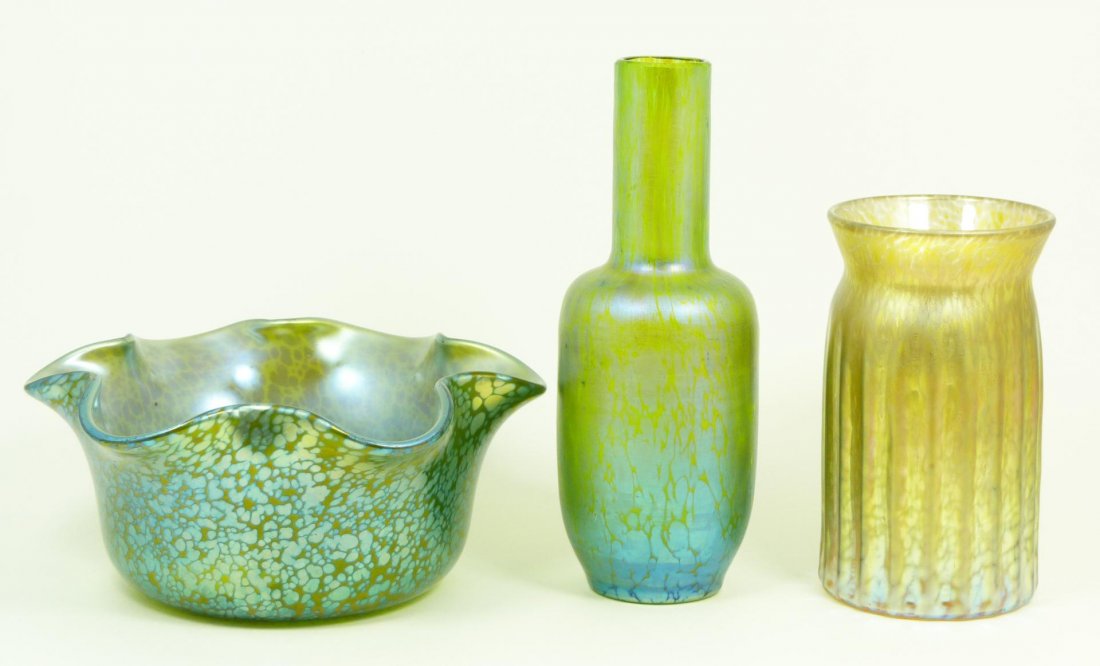 3 LOETZ IRIDESCENT ART GLASS BOWL & VASES: 3 piece log consisting of Loetz iridescent art glass bowl and two vases. Each having a green iridescent color throughout. Tallest vase measures 6 5/8" height (16.8cm). Total weight of 716 grams.