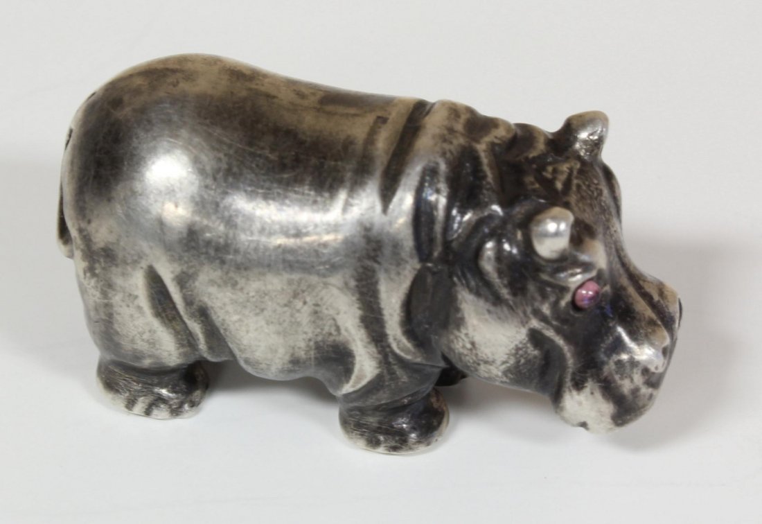 RUSSIAN SILVER HIPPOPOTAMUS FIGURE: Russian silver standing hippo figure having Cabochon cut pink sapphire jewels set to eyes. Has town marks and 84 silver purity marks to side of leg. Also holds Julius Rappoport's "I.P." workmaster mar
