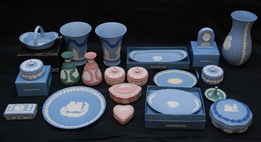 20 WEDGWOOD PORCELAIN MISCELLANEOUS ITEMS: 20 pieces of Wedgwood English Jasperware porcelain. Lot includes a basket, 3 oval dishes, 5 vases, a clock, 8 covered boxes, a plate, and a ring pin tray. Largest pieces measures 8 1/4" height (20.9cm