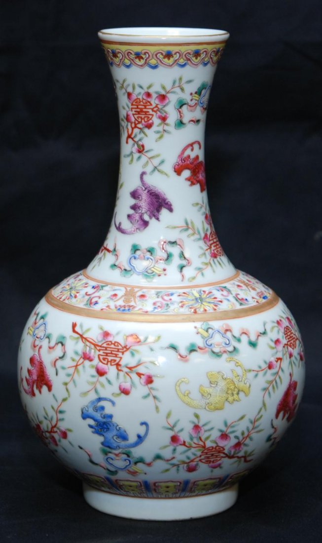 19th C CHINESE PORCELAIN LONG LIFE GUANGXU VASE: Antique Chinese porcelain hand painted enameled long life Guangxu vase. Has vivid multicolor design throughout depicting bats, and peaches. Holds six character calligraphy Guangxu (1875 - 1908) mark t