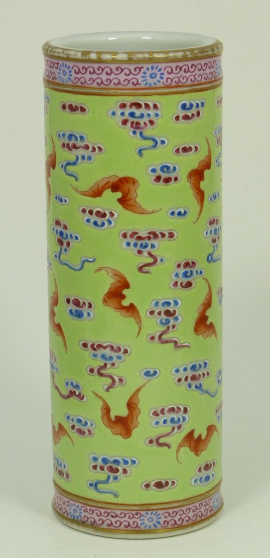 CHINESE FAMILLE ROSE DAOGUANG LONG LIFE BRUSH POT: Chinese Famille Rose Daoguang long life brush pot. Has hand painted bats design to exterior with clouds over light green ground. Holds six character Daoguang (1821 - 1850) calligraphy reign marks to b