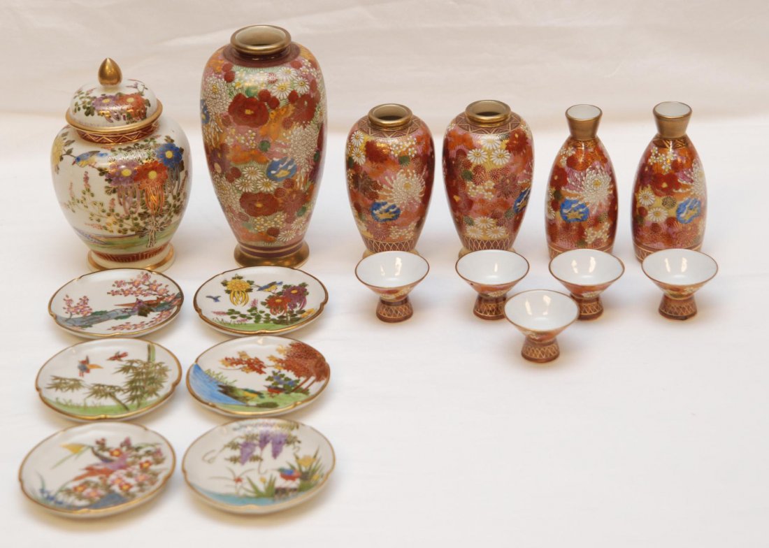 17 PIECE JAPANESE SATSUMA PORCELAIN SET: 17 piece set of Japanese Satsuma hand painted enameled porcelain pieces. Lot includes Ginger jar, 5 vases, 5 sake cups, and 6 small dishes. Each piece marked to bottom. Largest piece measures 7 3/8" h