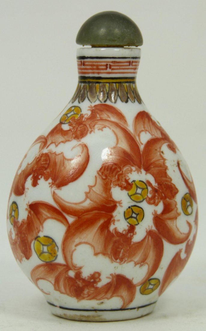 ANTIQUE CHINESE ENAMELED PORCELAIN SNUFF BOTTLE: Antique Chinese hand painted enamel polychromed porcelain snuff bottle depicting red bats with golden jing bi coins having gourd shape. Holds Kangxi reign mark to bottom (1662-1722) but made 19th cent