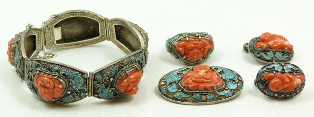 5pc SILVER & CORAL ENAMELED JEWELRY SUITE: 5 piece Chinese enameled mesh silver & red coral jewelry suite. Includes bracelet, pin, earrings and ring. Each piece having prong set relief carved Buddha figure and blue enameled bats with clouds. E