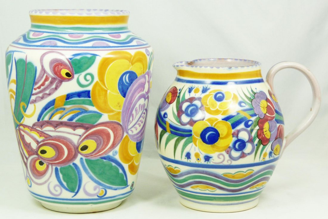 Pr POOLE CARTER STABLER & ADAMS POTTERY PIECES: Pair of Poole Carter Stabler and Adams pottery pieces. Lot includes a vase and pitcher. Each having a matching multicolor floral design throughout. Each holding impressed Poole porcelain marks to bott