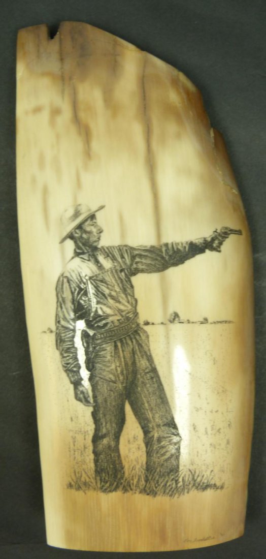 FOSSILIZED WALRUS TUSK SCRIMSHAW BY SOODALTER: Scrimshaw etching on fossilized walrus ivory tusk by Ron Soodalter (AMERICAN. 20th century) accomplished scrimshaw artist, historian, teacher and author. Mounted on fitted wooden base. Depicts a man i
