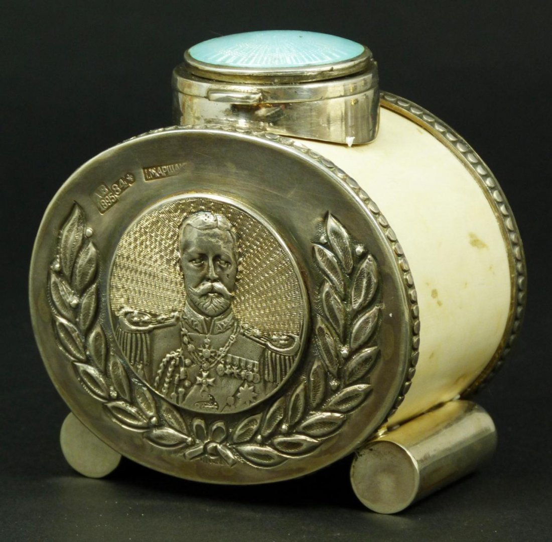 RUSSIAN SILVER & IVORY ENAMELED INKWELL: Antique Russian silver & ivory inkwell. Has ivory body clad with silver discs to front and back. Front disc holding a coin depicting Nicholas II in wreath. Verso has chased boar hunt scene. Hinged cov