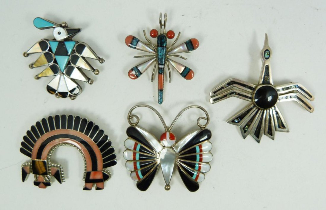 5pcs ZUNI & MEXICAN STERLING PIN/PENDANTS: To include signed pieces; consisting of Onyx and Coral pin by Fadrian Bourannie; a butterfly pin by Sara Edaakie made from Mother of Pearl, Turquoise, Coral, and Onyx; and three smaller signed pins. T