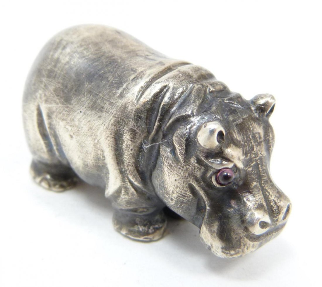 RUSSIAN SILVER HIPPOPATAMUS FIGURE: Russian silver standing hippo figure having Cabochon cut pink sapphire jewels set to eyes. Has town marks and 84 silver purity marks to side of leg. Also holds Julius Rappoport's "I.P." workmaster mar