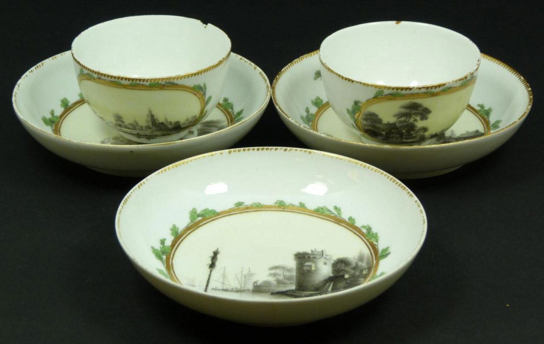 5 PIECES KPM HAND PAINTED CUPS & PLATES: A lot of 5 Berlin KPM hand painted pieces. Lot includes 2 cups and three under plates. Each having a hand painted river landscape scene with leaf and butterfly border design and gold accenting. 18th/1