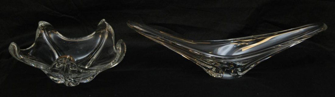 2 DAUM NANCY FRENCH CRYSTAL CENTER BOWLS: A lot of 2 Daum Nancy France crystal center bowls. One having an oblong design (28" length) and the next a curled tip five point star design (16" diameter). Each holding etched Daum France signature.