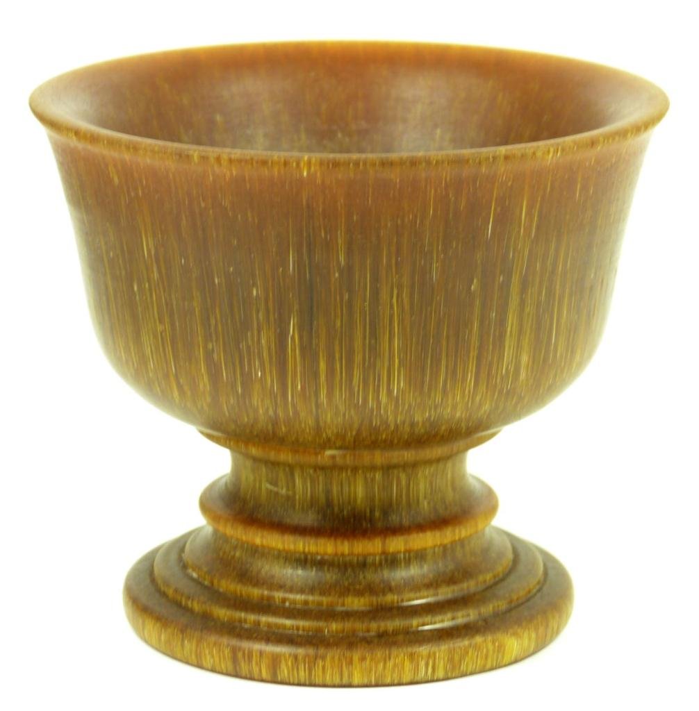 ANTIQUE CHINESE CARVED RHINO HORN GOBLET: Antique Chinese hand carved rhinoceros horn goblet. Cup bowl with tiered foot. 18th/19th century. Measures 3 3/8" height x 4" diameter (10.1cm x 10.1cm). Total weight of 332 grams.