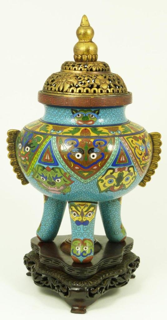 CHINEST CLOISONNE TRIPOD CENSOR WITH FINIAL COVER: Old Chinese enameled metal cloisonne tripod censor. Has hulu form finial to cover over reticulated floral screen. Body has foo mask design throughout. Feather form handles to sides of body. Includes f