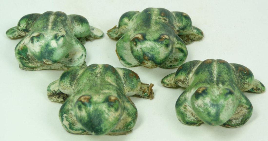 A LOT OF 4 HAN DYNASTY GREEN GLAZED POTTERY FROGS: A lot of four antique Chinese Han dynasty green glazed pottery frogs. Each measures approx. 1 1/8" height x 2 3/8" length (2.8cm x 6cm). Total weight of 162 grams.