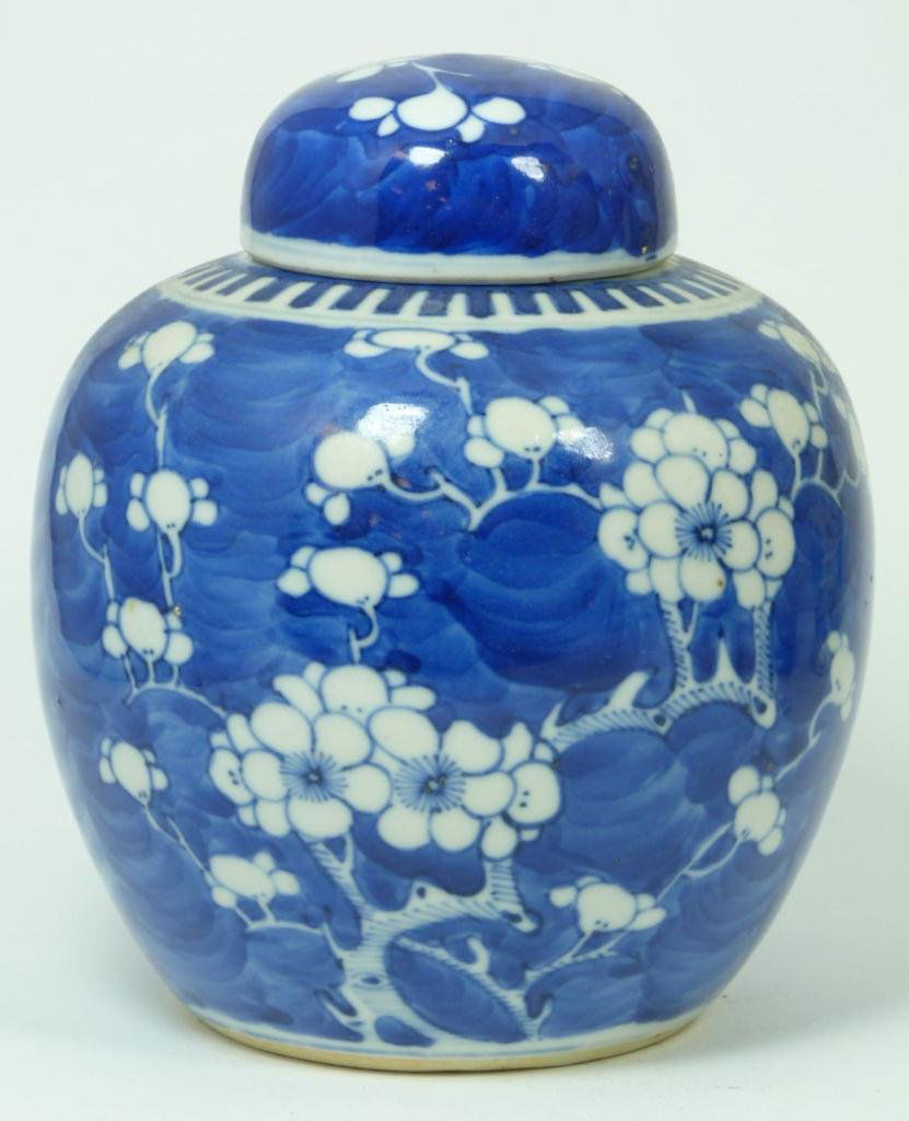 19th CENTURY CHINESE PRUNUS GINGER JAR: Antique Chinese prunus covered ginger jar. Bottom holds double circles. Mid to late Qing dynasty period. Measures 5 3/4" height (14.6cm). Total weight of 584 grams.