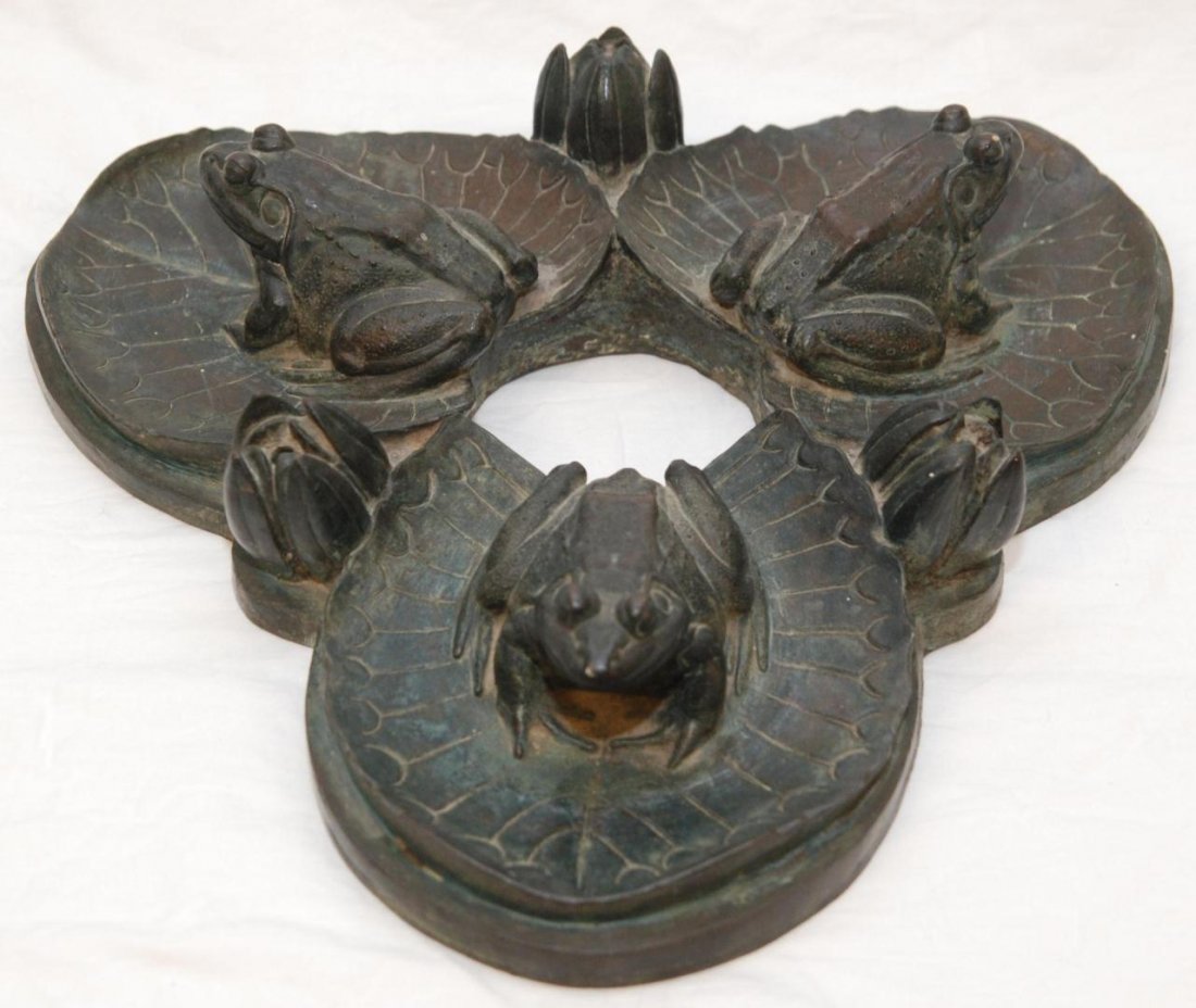 BRONZE SCULPTURE OF FROGS ON LILY PADS SHONNARD: Eugénie Frederica Shonnard (AMERICAN, 1886-1978) bronze animal group sculpture depicting frogs on lily pads. Signed F. Shonnard to base and numbered 3/15. Measures 3" height x 14" width (7.6cm x 35.5