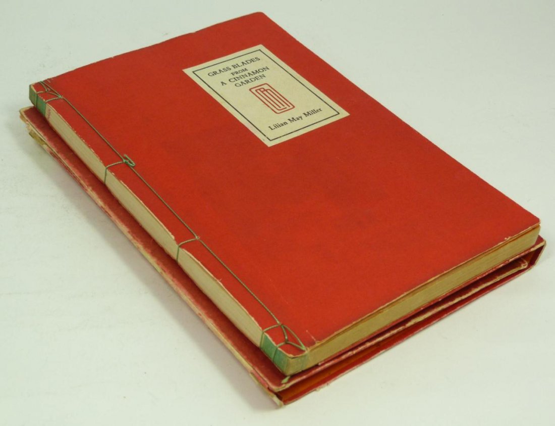 GRASS BLADES FROM A CINNAMON GARDEN SIGNED: A signed Lilian May Miller book titled "Grass Blades from a Cinnamon Garden". Singed by the author. Has numerous applied printed images. Includes box style cover. Measures 9 3/8" length x 6 3/8" width