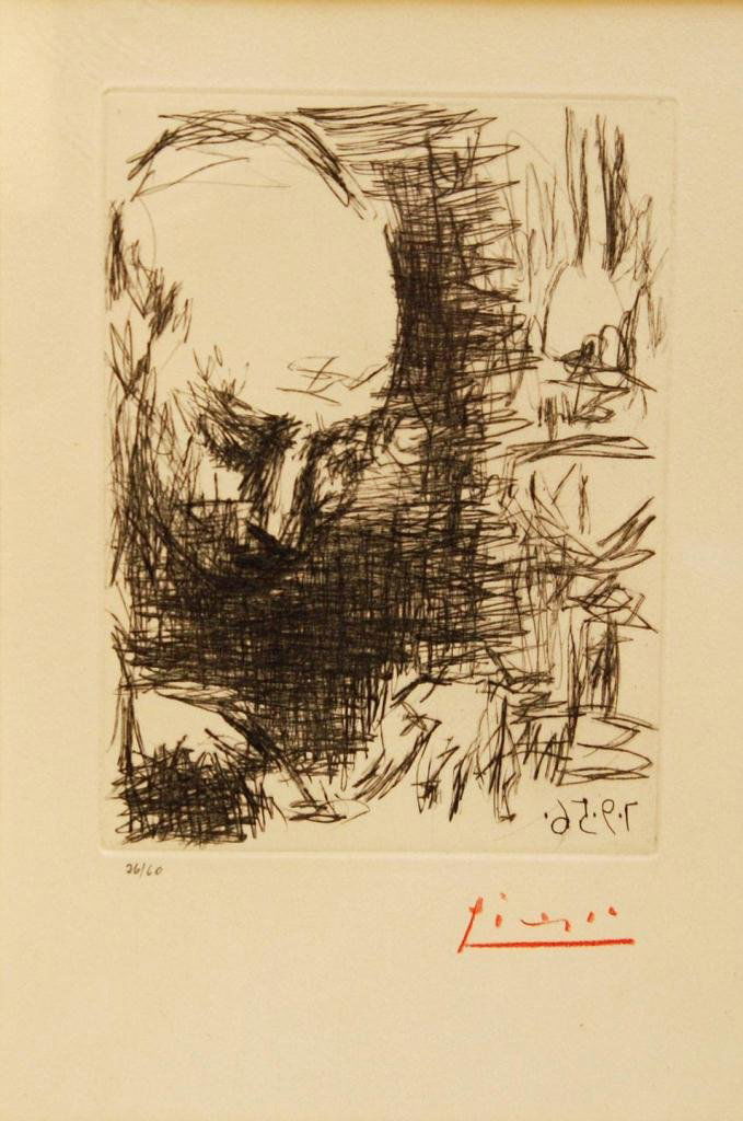 PABLO PICASSO HAND SIGNED & NUMBERED LITHOGRAPH: Picasso lithograph of an etching depicting a studying man. Signed in red crayon to lower right. Numbered 26/60 to lower left. Measures 11 3/4" height x 8" width + 4 1/2" mat & frame (29.8cm x 20.3cm +