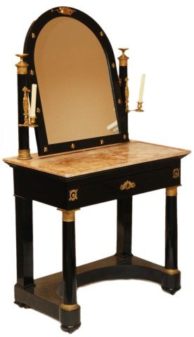 ITALIAN EMPIRE EBONIZED WOOD & GILT VANITY: A fine ebonized wood & gilt wood vanity. In the Italian Empire style. The mirror frame is embedded with star studs. The sides hold the ormolou candelabra. Has ormolou sphinx and and amber and white in