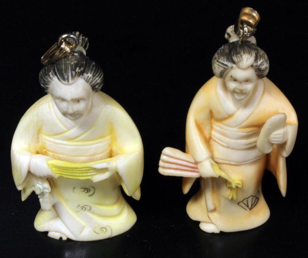 JAPANESE IVORY AND GOLD MAIDEN NETSUKE PENDANTS: Antique hand carved Japanese ivory netsuke maiden figures, each fitted with a gold bail. 19th century. Each measures approx. 2" height (5.1cm). Total weight of 36 grams.