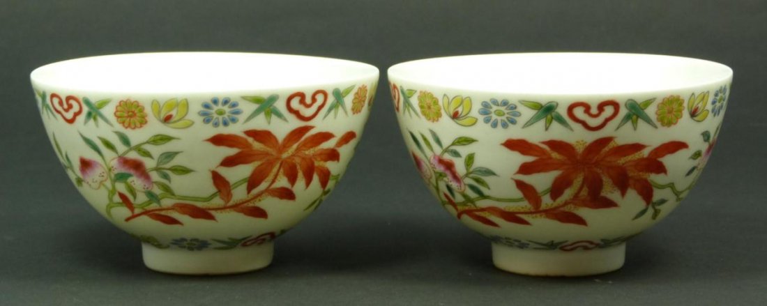 PAIR OF CHINESE WUCAI PORCELAIN DAOGUANG BOWLS: Pair of Chinese Wucai porcelain Daoguang hand painted bowls depicting bats and peaches with leaves. Each holds Daoguang (1821 - 1850) six character archaic reign marks to bottom and is made of the per