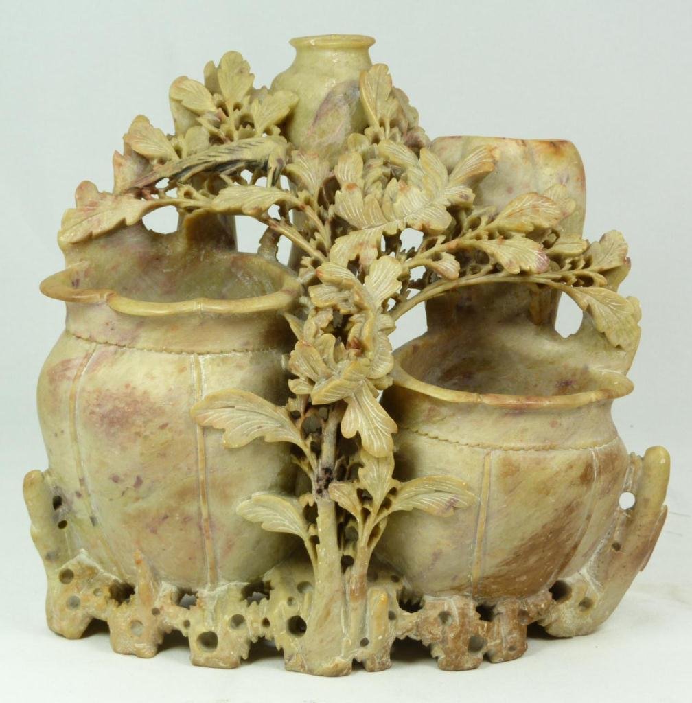 CHINESE HAND CARVED SOAPSTONE FLORAL PLANTER: Chinese fully relief carved soapstone planter depicting flowers and bird near jars. 19th/20th century. Measures 8 1/4" height x 9" width (20.9cm x 22.8cm). Total weight of 2424 grams.