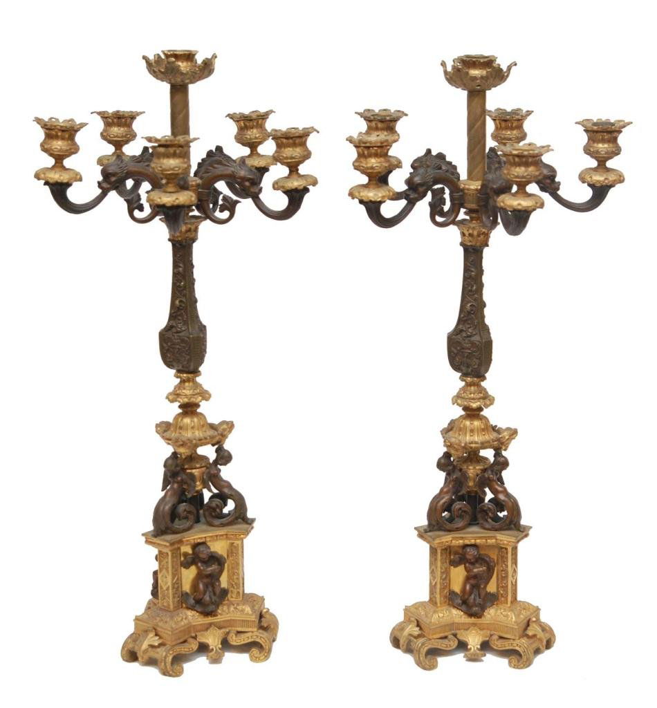 PAIR OF EARLY 20th C BRONZE 6 ARM CANDELABRAS: Pair of old European gilded bronze 6 arm candelabras each with a stunning cherub design with wing busts of nude females. Intricate raised scrolled floral design throughout. Figural fish beasts with sc