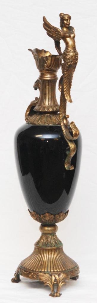 FRENCH DORE BRONZE & ENAMEL FIGURAL EWER: Old French Dore bronze ewer having a figural nude winged female bust handle and dragon design to front of spout. Black enameled body. Tripod base with scrolled leaves feet. 19th/20th century. Measures