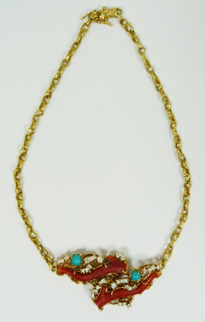 18K ARTHUR KING DIAMOND CORAL & TURQUOISE NECKLACE: 18k yellow gold Arthur King designer necklace having attached pendant holding two coral freeform branches, two round cabochon cut turquoise stones, each measuring approx. 6.20mm diameter. Pendant also