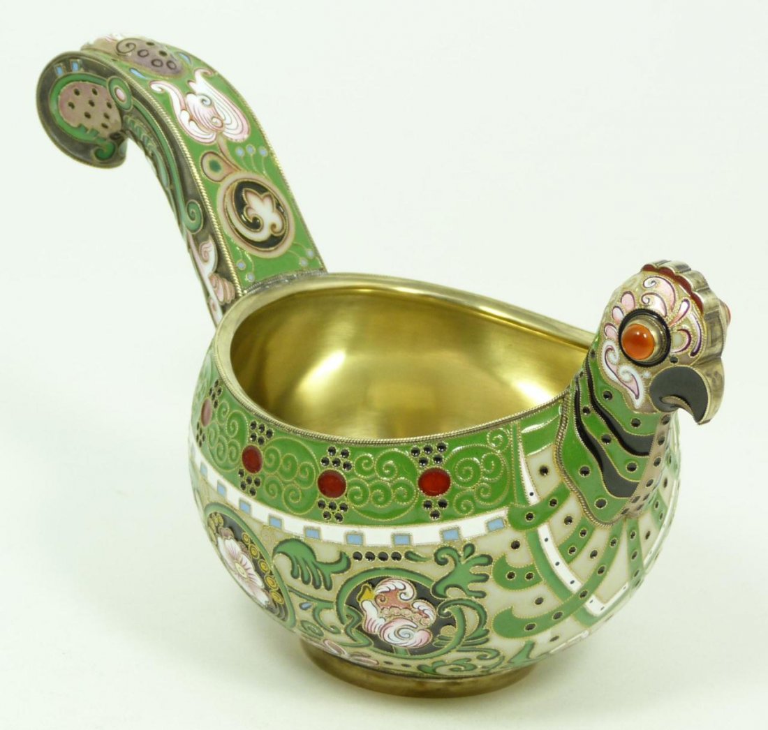 RUSSIAN SILVER AND ENAMEL FIGURAL ROOSTER KOVSH: Russian silver enameled Kovsh having scrolled floral design throughout with figural chicken head design. Has cabochon cut carnelian stones set to eyes. Gold wash interior. Holds Cyrillic Fedor Ruckert