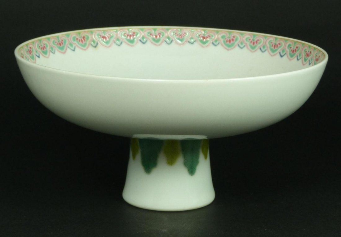 18th CENTURY CHINESE PORCELAIN STEM BOWL: Antique Chinese Qing Dynasty period hand painted enameled stemmed dish. Interior depicts bats with symbol in center and has stylized Lingzhi border design on rim. Bottom depicts lotus blossoms with sc