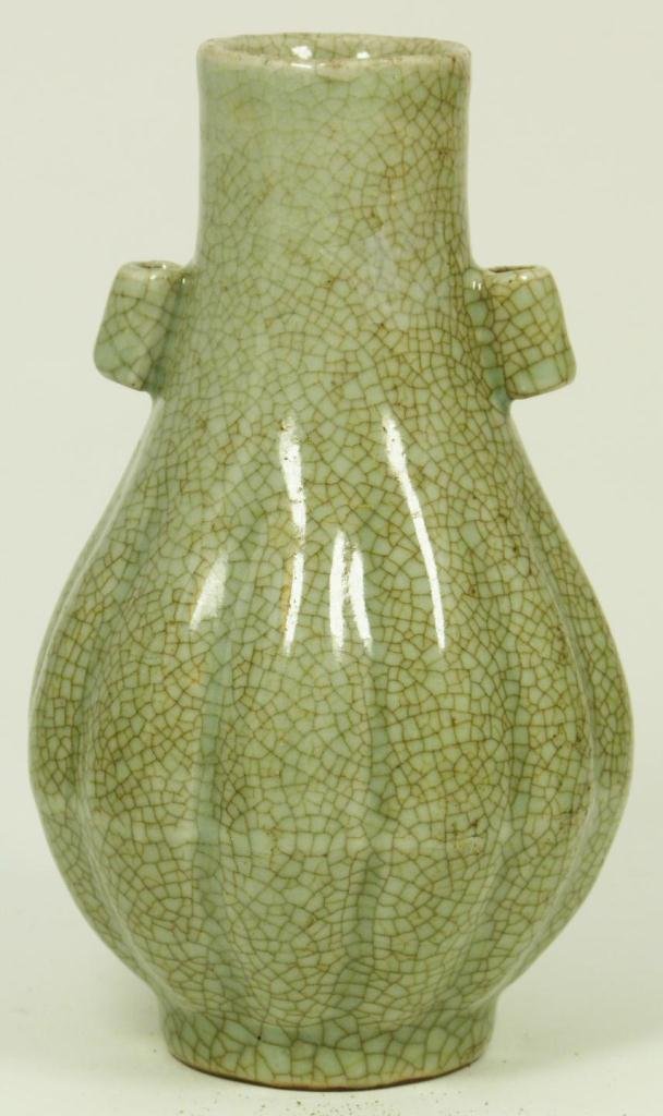 18th CENTURY CHINESE CRACKLE CELADON VASE: Antique Chinese crackle glaze celadon hu form vase with ribbed design. Bottom holds six character blue calligraphy Ming Dynasty Chenghua reign marks, but made early to mid Qing dynasty period. Measure