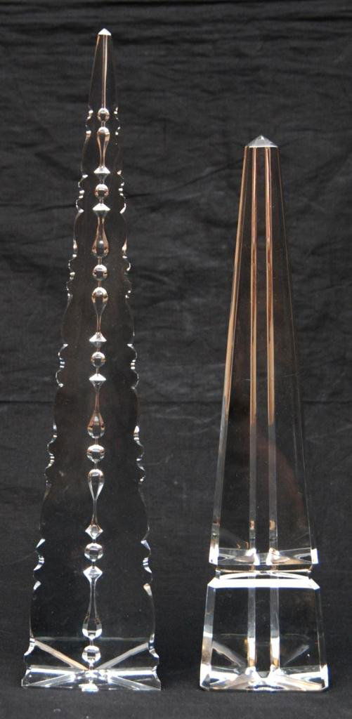 2 BACCARAT FRANCE CRYSTAL OBELISKS: Lot of 2 Baccarat France crystal obelisks. Each has triangular form and Baccarat marks on bottom. Tallest measures 18 1/8 inch height (46 cm). Total weight of 4414 grams.