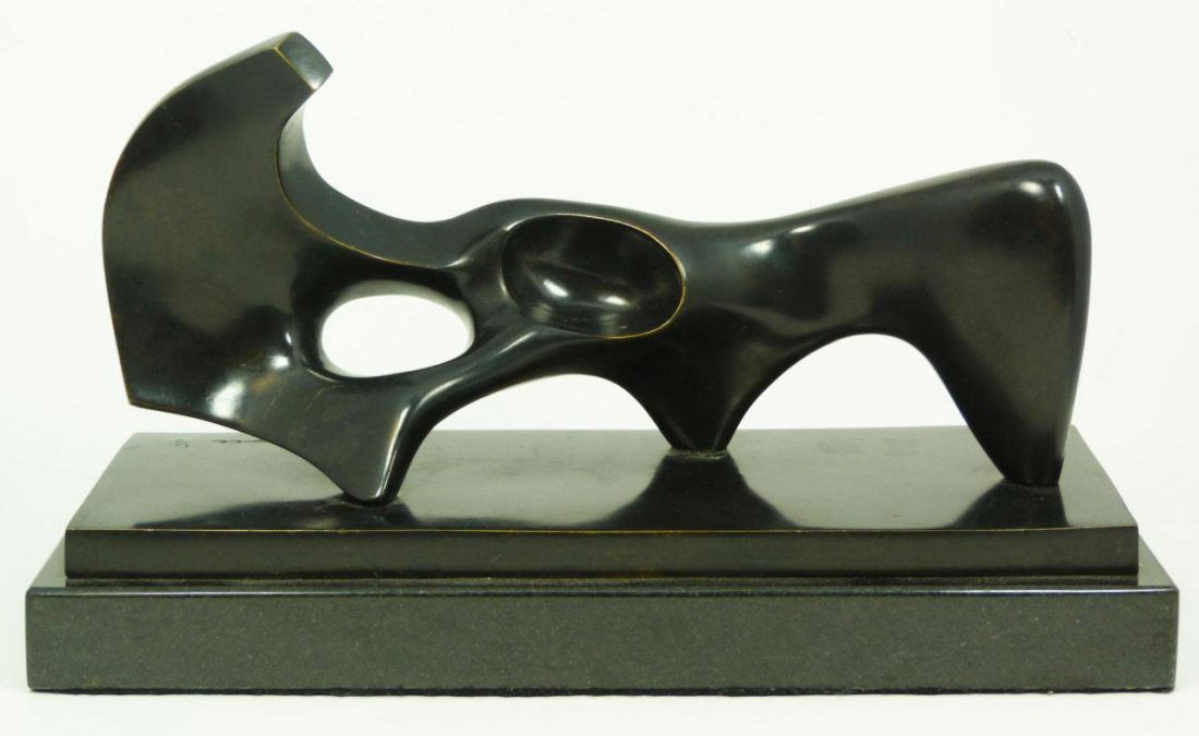 HENRY MOORE ABSTRACT BRONZE SCULTPURE: Abstract bronze sculpture signed Moore on base and numbered after 'henry moore 1/9'. Mounted on black marble base. After Henry Moore (BRITISH, 1898-1986). Measures 6 1/2" height x 12 3/4" length + 1 3
