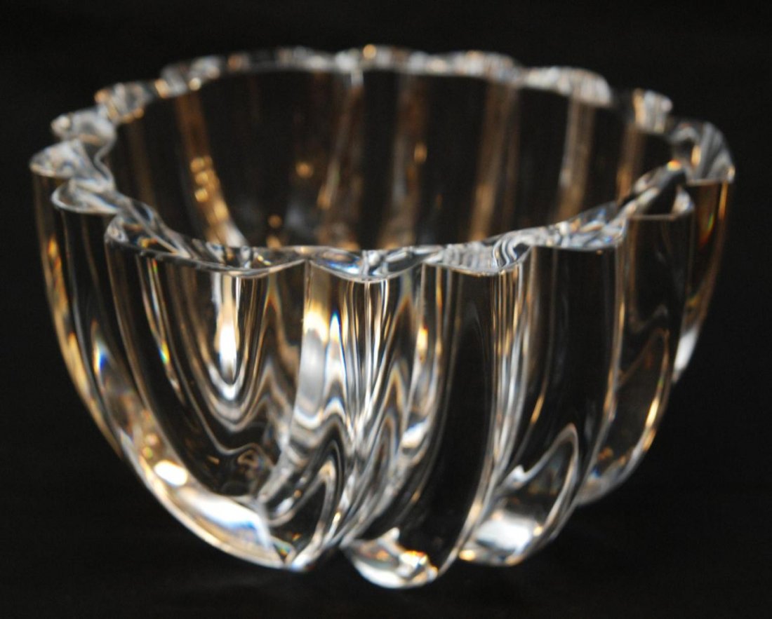 ORREFORS HEAVY RIBBED CRYSTAL BOWL: Heavy art glass ribbed crystal bowl. Signed 'Orrefors 7 4368-121' on bottom. Measures 5 inch height (12.7 cm) x 8 3/8 inch diameter (21.3 cm). Total weight of 4026 grams.