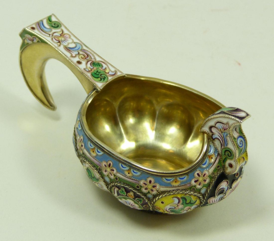RUSSIAN ENAMELED SILVER KOVSH GRACHEV BROS.: Russian silver kovsh, beautifully decorated throughout with vivid multicolor enamel design. Gold wash Interior. Bottom holds 84 silver purity and town marks. Holds Grachev Brothers workmaster marks on