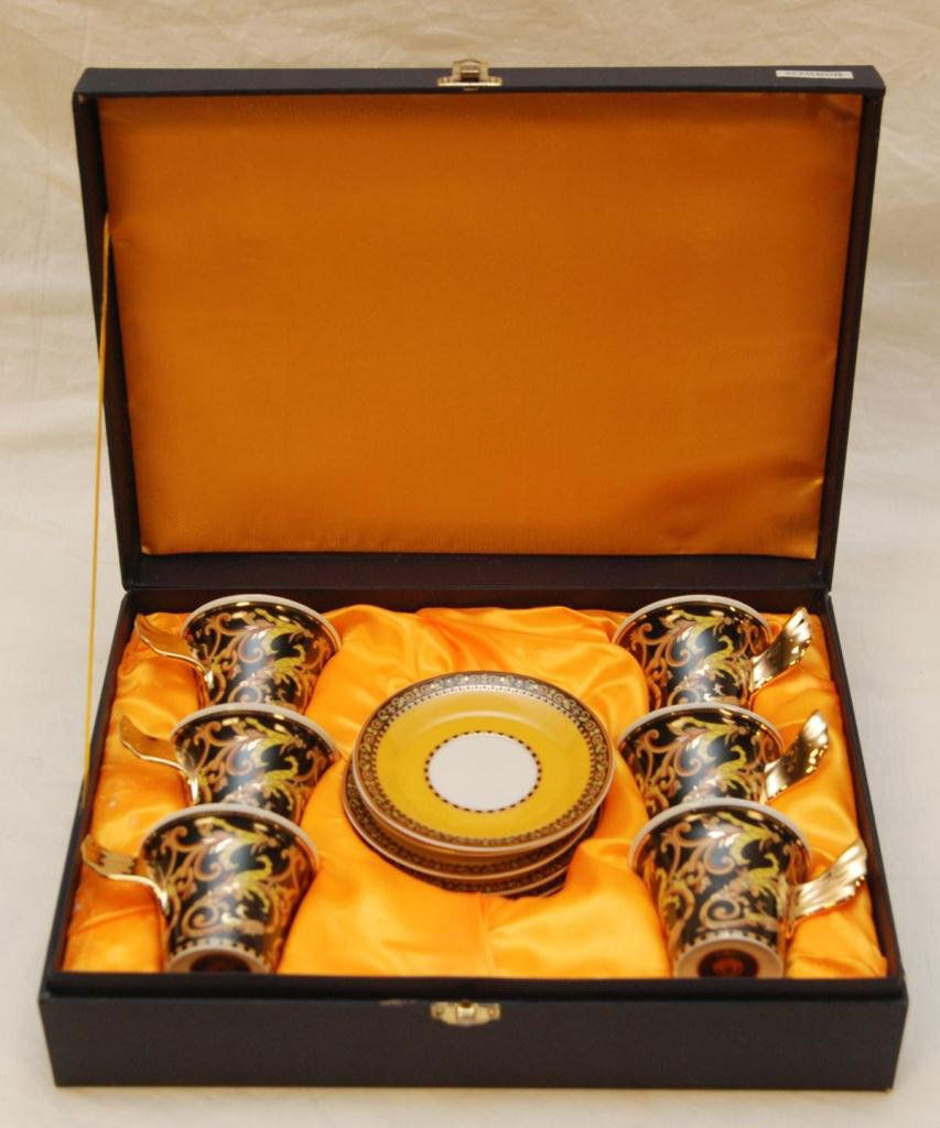 12pc ROSENTHAL VERSACE BAROCCO CUP & SAUCER SETS: 12 piece set of Rosenthal Versace German porcelain hand painted demitasse cup and saucers in the 'Barocco' pattern. Set includes 6 demitasse cups and saucers. Includes fitted Yusui presentation box. E