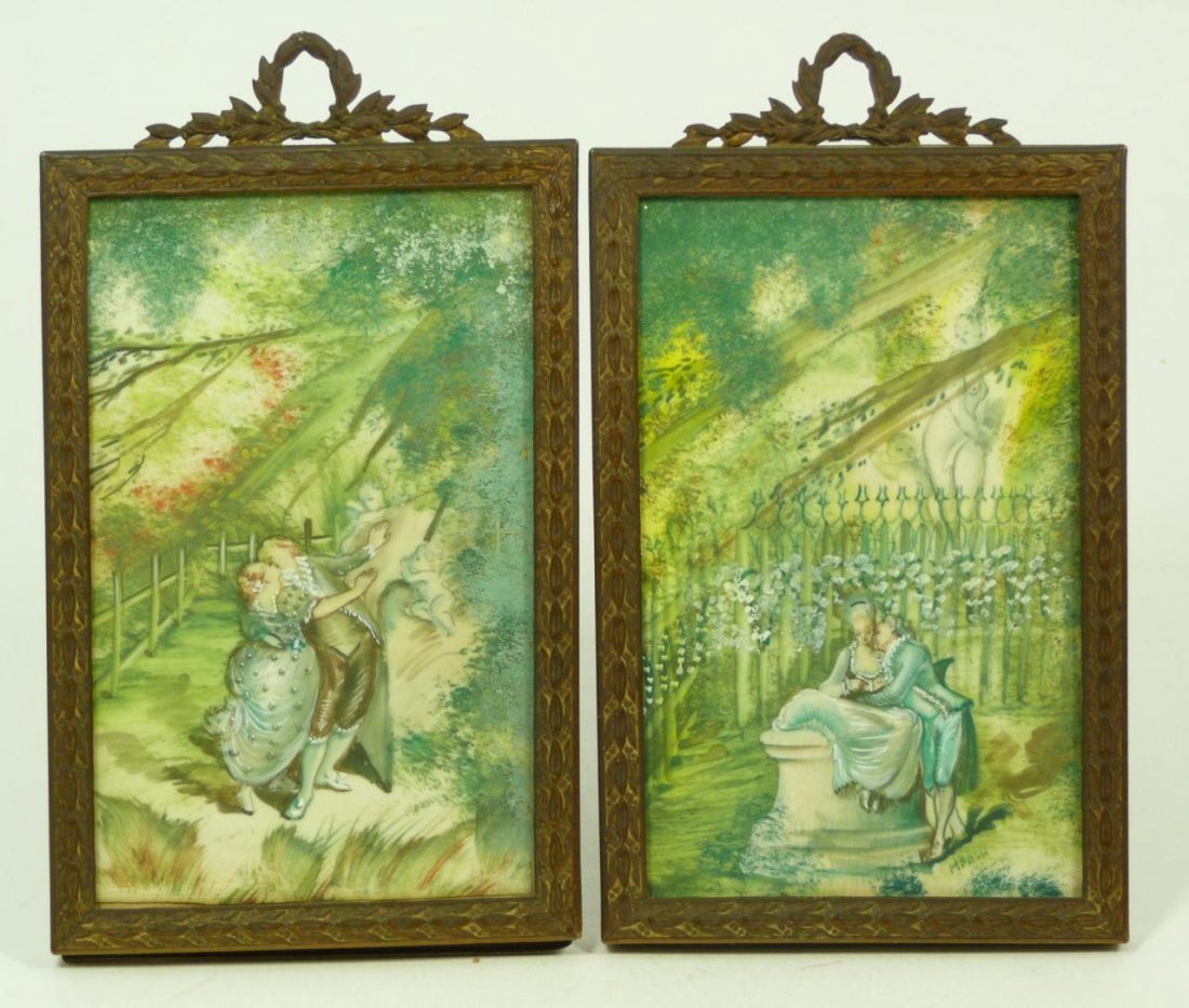 Pr ANTIQUE OIL PAINTINGS ON IVORY PLAQUES, SIGNED: A pair of antique Continental oil paintings on ivory plaques depicting courting couples in garden scenes. Plaques mounted in matching old bronze floral frames with wreathes on top. Original glass scre