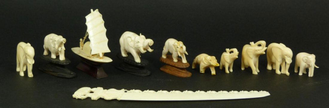 LOT OF 11 CHINESE CARVED IVORY ITEMS: A lot of 11 Chinese hand carved ivory items including 9 elephant figures, a boat, and an elephant bridge letter opener. Largest piece measures 8 5/8" length (21.9cm). Total weight of 198 grams.