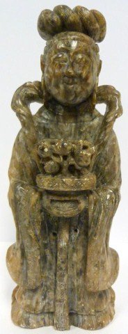 CHINESE HAND CARVED GUAN YIN WITH FLOWER BASKET: Antique hand carved Chinese soapstone Guanyin with basket and flowers. Has relief carving throughout. 19th/20th century. Measures 14 5/8" height (37.1cm).