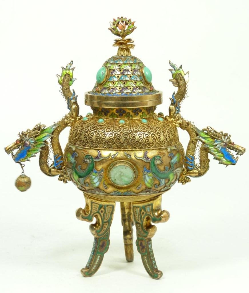 CHINESE ENAMELED SILVER VERMEIL URN: Chinese vermeil filigree silver enameled dragon tripod urn with figural dragon handles. Enameled scrolled phoenix bird on body. Applique ling zhi boarder design on neck. Has two round translucent whit